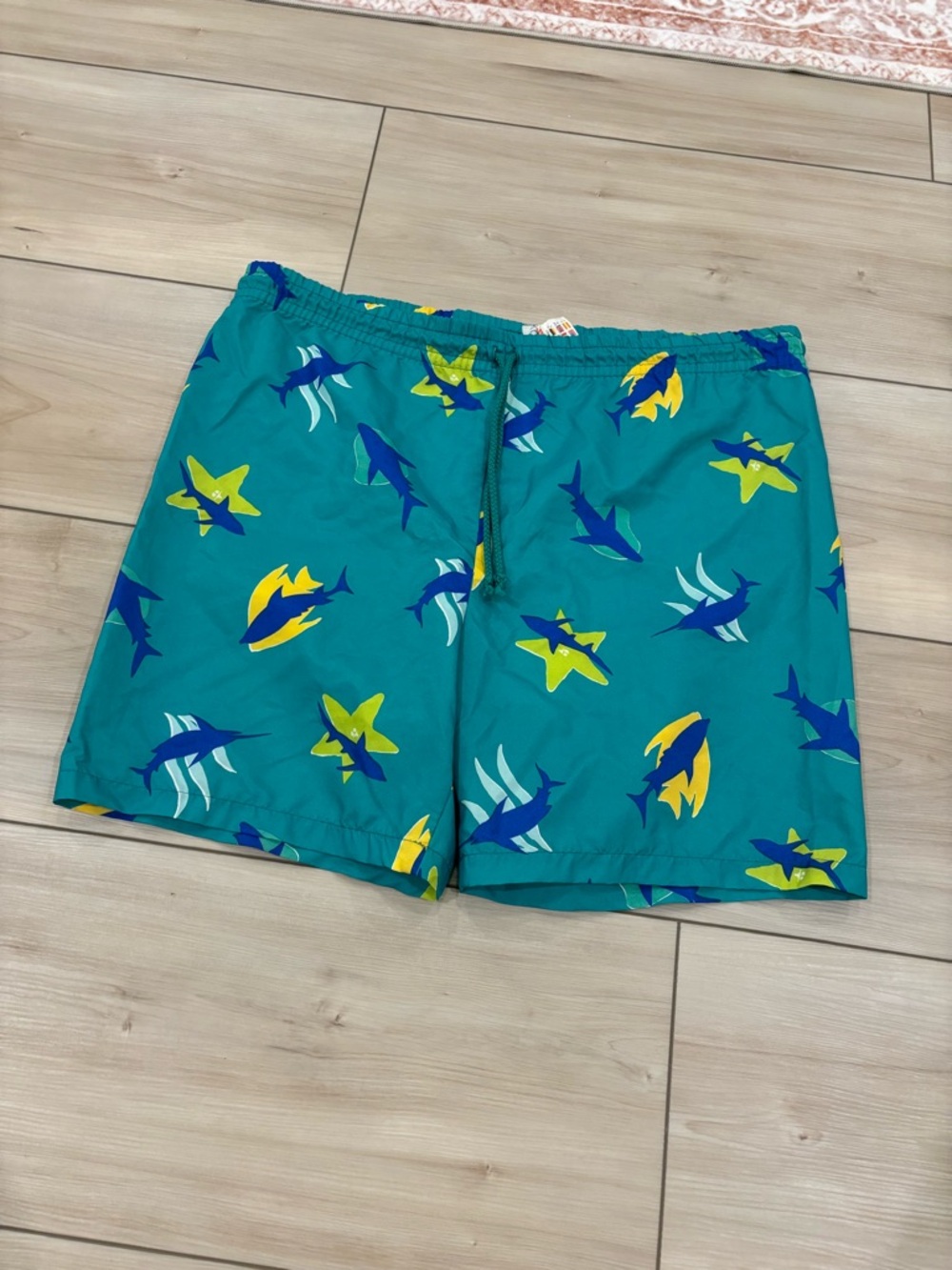 Kone’s Vintage Teal Swim Trunks with Blue and Yellow Shark & Starfish Print